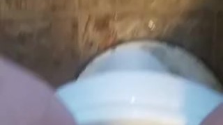 Power piss on bathroom wall