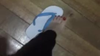 @ticii_feet tici feet ticii_feet ticii feet IG wearing classic blue havaianas, red toenails