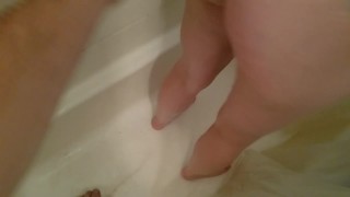 Pissing on bald pussy