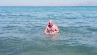 Gay nudist beach swimmer