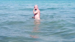 Gay nudist beach swimmer