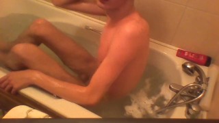 Skinny teen gives him self a good wash in his bath tub