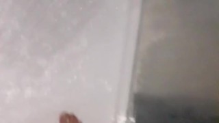 Stroking and measuring hot wet and soapy little hard dick in the shower 