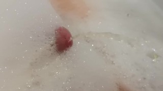 Pissing in a bathtub with foam