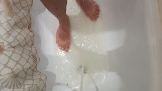 Peeing in a shower on my feet