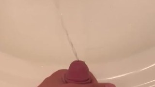 Stroking out a piss in the sink