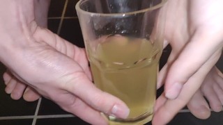 Pissing in a glass for you to drink