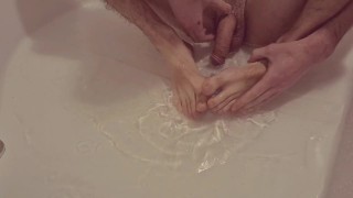 Feet and cock, scrubbing and rubbing 