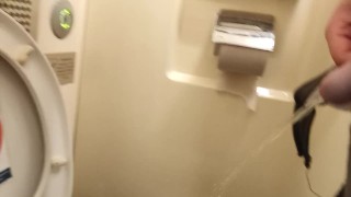Pissing in a dirty public toilet in the train