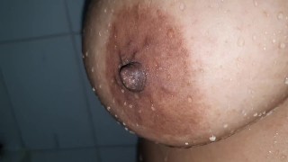 Washing my huge tits
