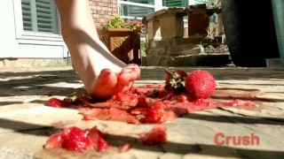 Sexy half Asian girl tramples fruit with her feet