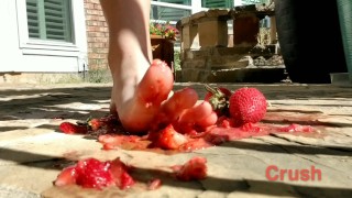 Sexy half Asian girl tramples fruit with her feet