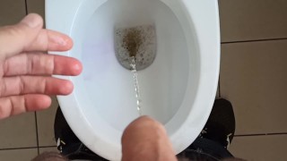 Peeing in the toilet, pissing my palm, fingers and some jeans ... Warm trickle ...