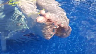 MILF Mistress Vixie's Soles And Toes In The Pool.