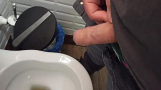 Peeing in a public toilet