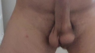 My husband is playing with his cock