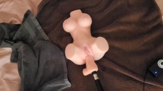Masturbating to a sex doll getting fucked by a dildo machine