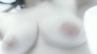 Bouncing my pale natural boobs from a funny angle.
