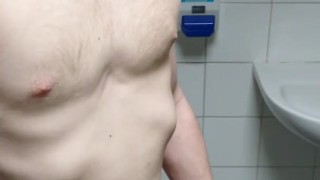 Skinny boy strips and shows off dick in university bathrooms