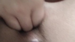 Slut plays with dildo
