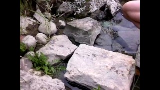 Boy scout in short shorts wanks his twink dick outdoors in the forest and cums on the rocks