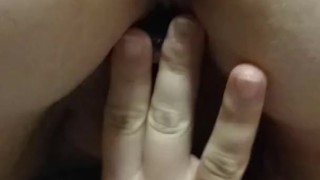 Wife stuffs her holes with some toys