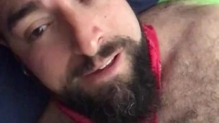 Big bearded and hairy bear wanking rubbing the bed sheet on his hard and wet cock. Beautiful Agony