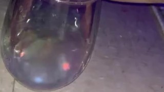 Pissing in a wine glass