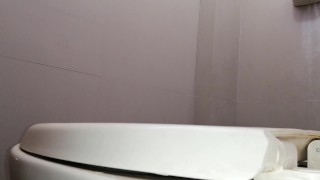 I film my friend peeing standing up in my bathroom.