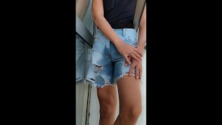 Pee desperation and wetting short jeans after I am locked out on a balcony