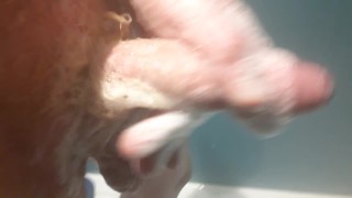 Stroking my small soapy cock in the shower 