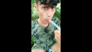 Twink drinks fresh cum from used condom till last drop outdoor