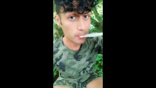 Twink drinks fresh cum from used condom till last drop outdoor