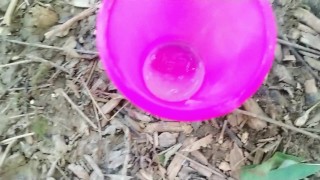 Big cock cums into a cup and lets his cum load at the cruising area for horny guy