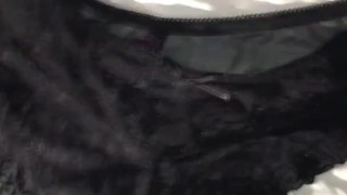 Shooting my cum on black lace panties.
