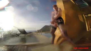 Sexy mature Red XXX masturbates outside by the pool