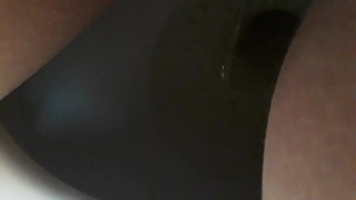 Wet loud peeing in public toilet close up