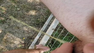 FTM Spraying Pee From Fence