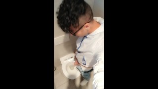 Twink with fat uncut cock piss at a rest stop toilet