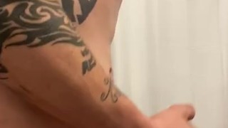 Tattooed male jerking off with dirty talk and moaning and cumming on hand 