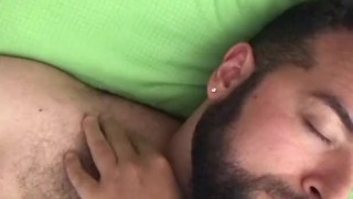 Big horny bearded Italian bear with hairy chest strokes his body