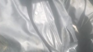 Quick jerk in muddy polyurethane suit on sunny day in diesel 4wd