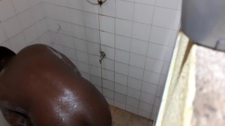 Chubby black boy shakes big ass and showers