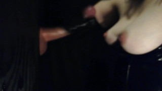 Black latex gloves at the gloryhole