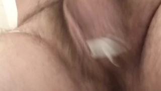 Piss in the palm of my hand and stroking the dick in the toilet.