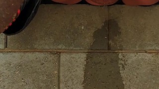 Taking a long piss outside in public 