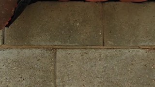 Taking a long piss outside in public 