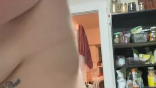 Milkymama squirts milk up close in her kitchen 