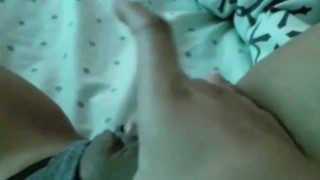 Teen fingers her pussy on camera 