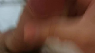 Twink masturbating in bed, close-up freshly shaved balls